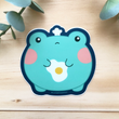 Load image into Gallery viewer, Cute Frog w/ Fried Egg Vinyl Sticker by Fat Rabbit Farm