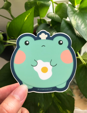Cute Frog w/ Fried Egg Vinyl Sticker by Fat Rabbit Farm